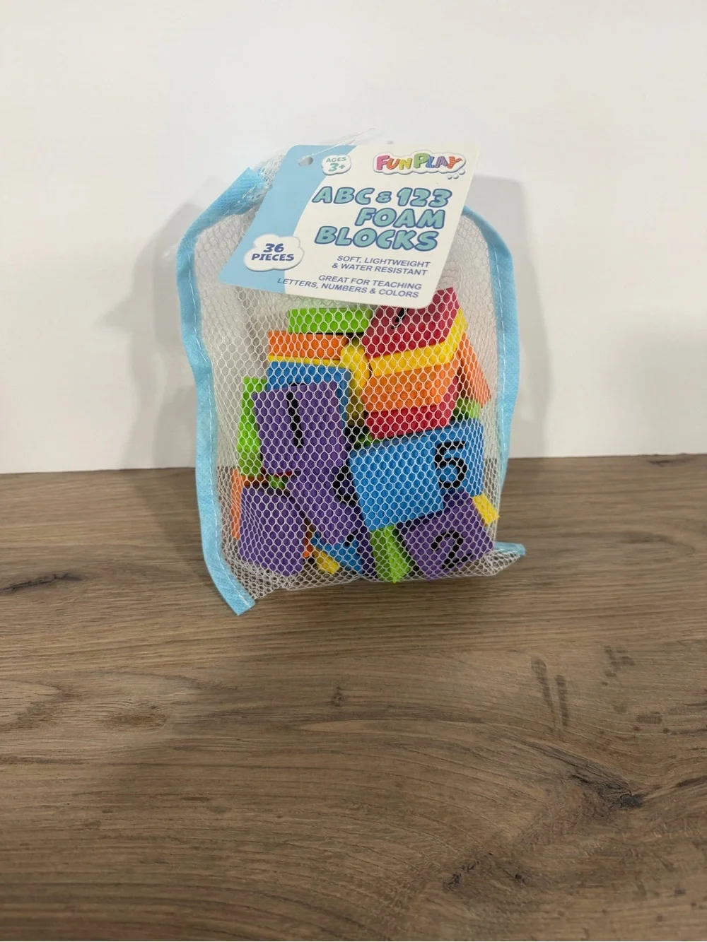 Foam Blocks in a Blue Mesh Bag. ABC & 123 Foam Blocks - Multicolor Learning Set